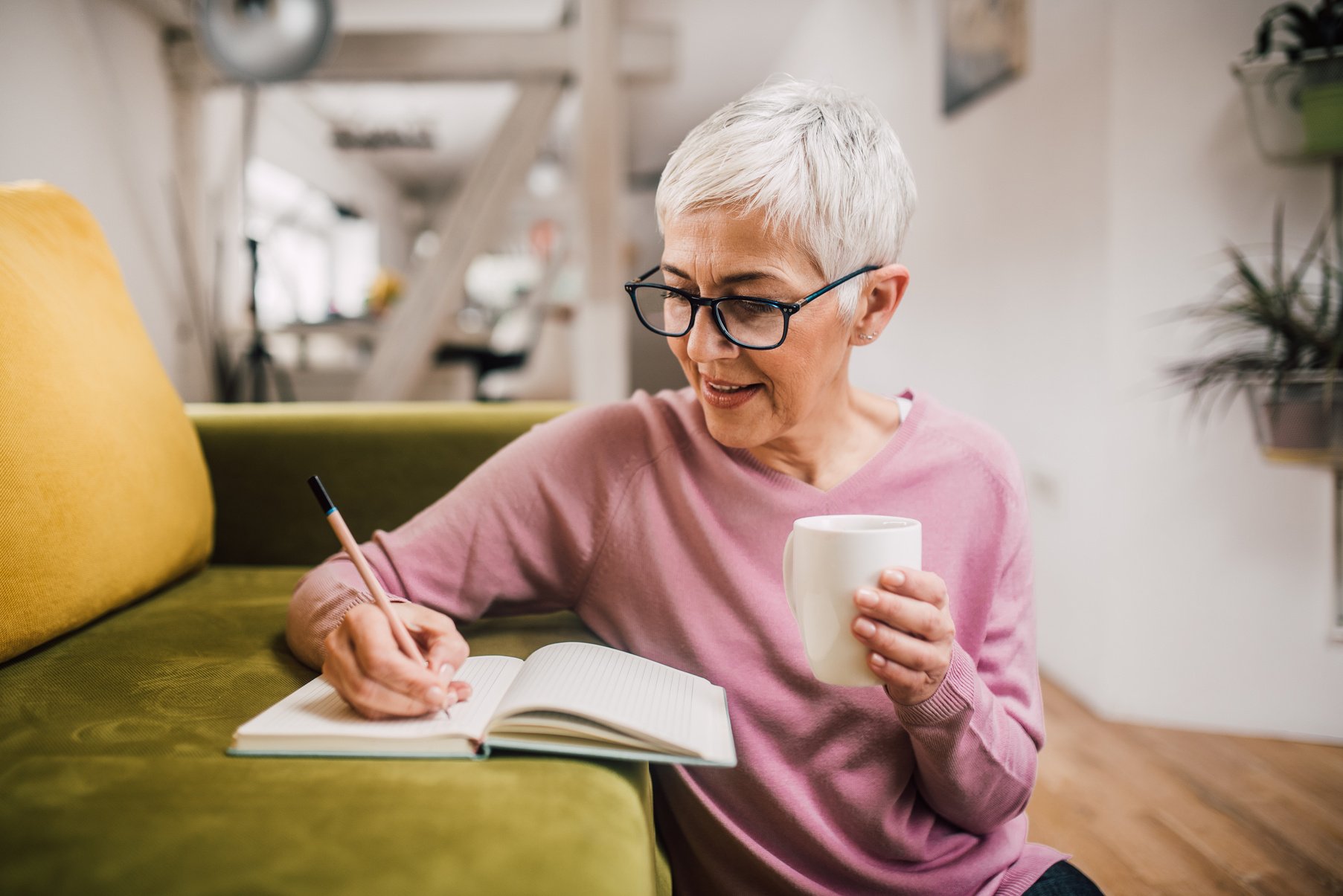 Mature woman writing